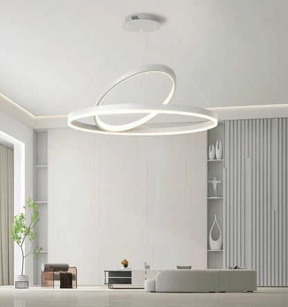 Modern interior design with a ceiling light fixture in a minimalistic room.
