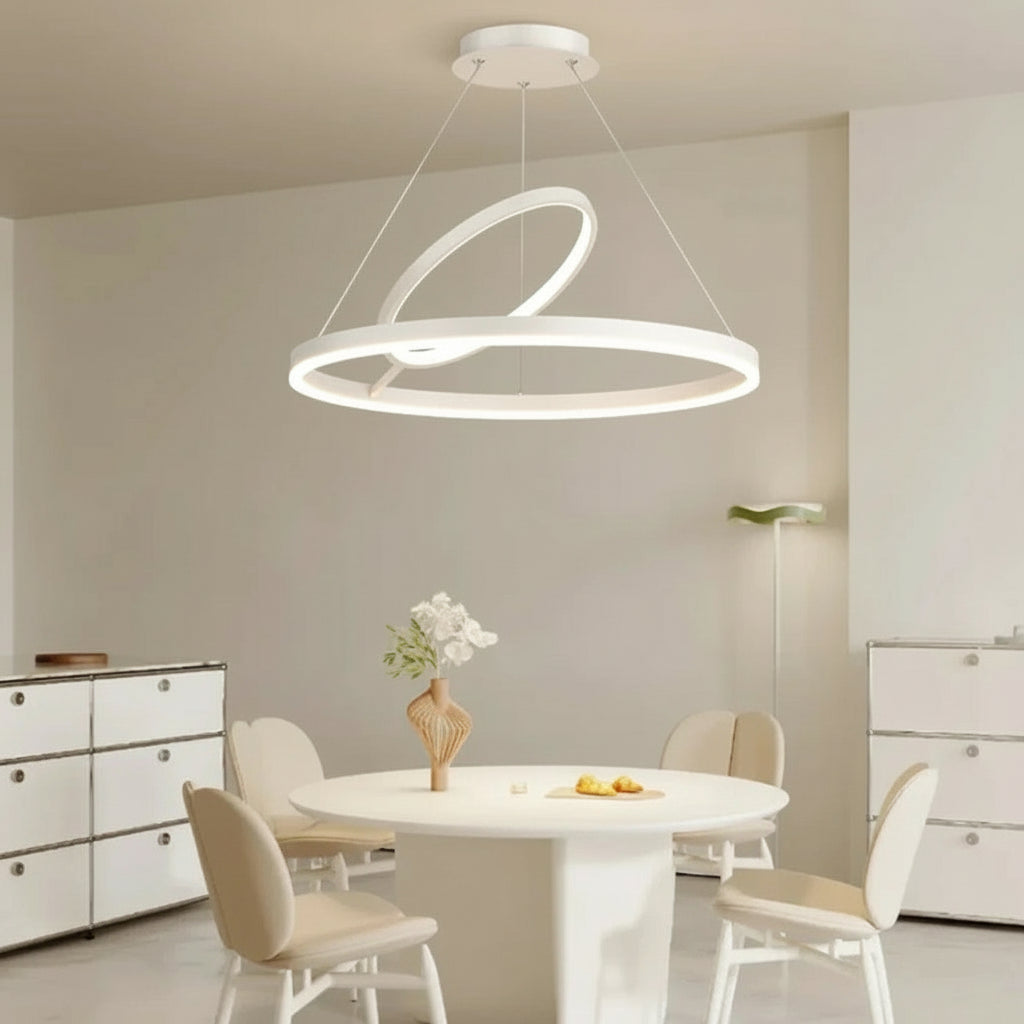 Modern dining room with a white pendant light fixture.