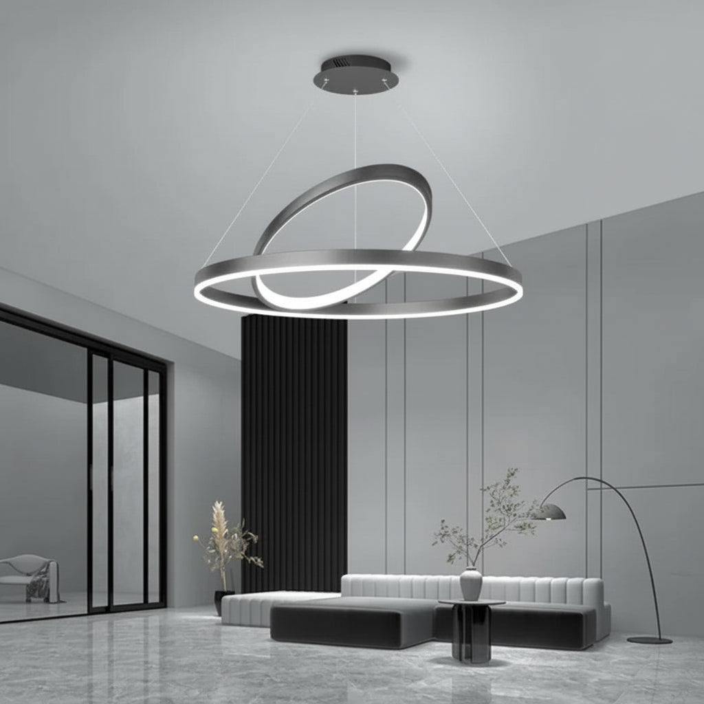 Modern living room with a stylish pendant light fixture.