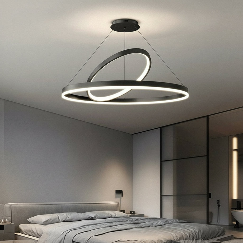 Modern pendant light fixture in a bedroom setting with KAGU branding.