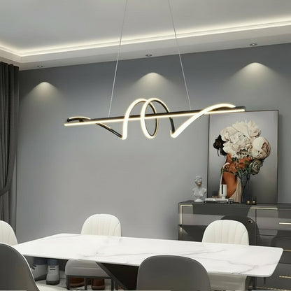 Modern dining room with a stylish pendant light fixture.