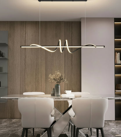 Modern dining room with a stylish pendant light fixture.