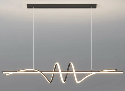 Modern pendant light with wavy design on a gray background